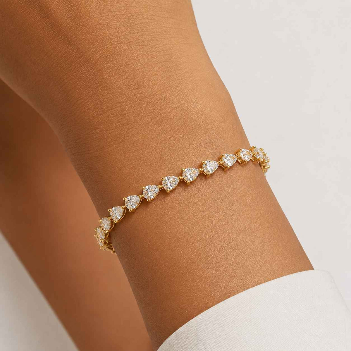 Bezel-Set Pear Diamond Tennis Bracelet, 5.60ct total in Yellow Gold