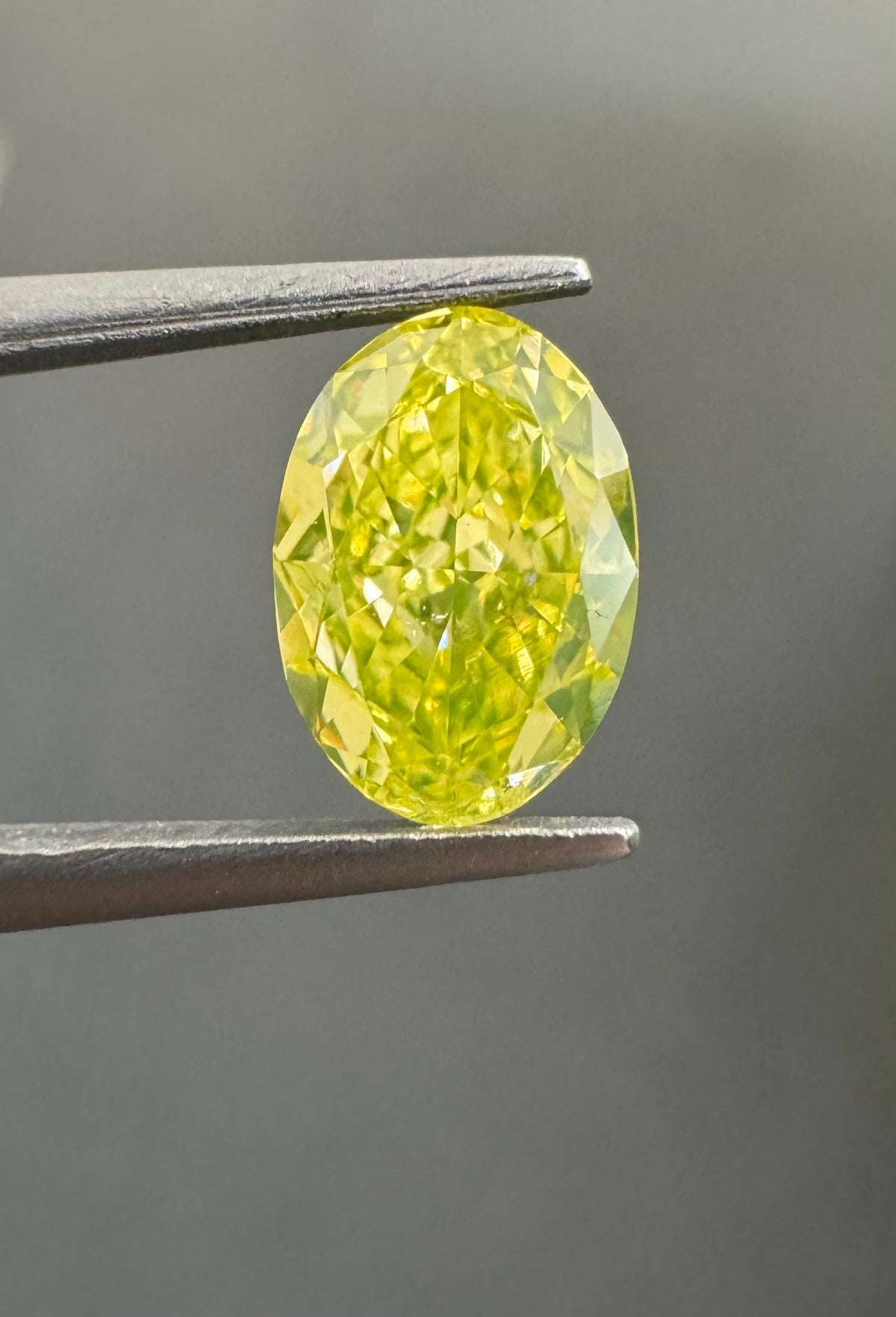 Oval Fancy Intense Greenish Yellow Natural Diamond 0.78ct VS2 loose diamond