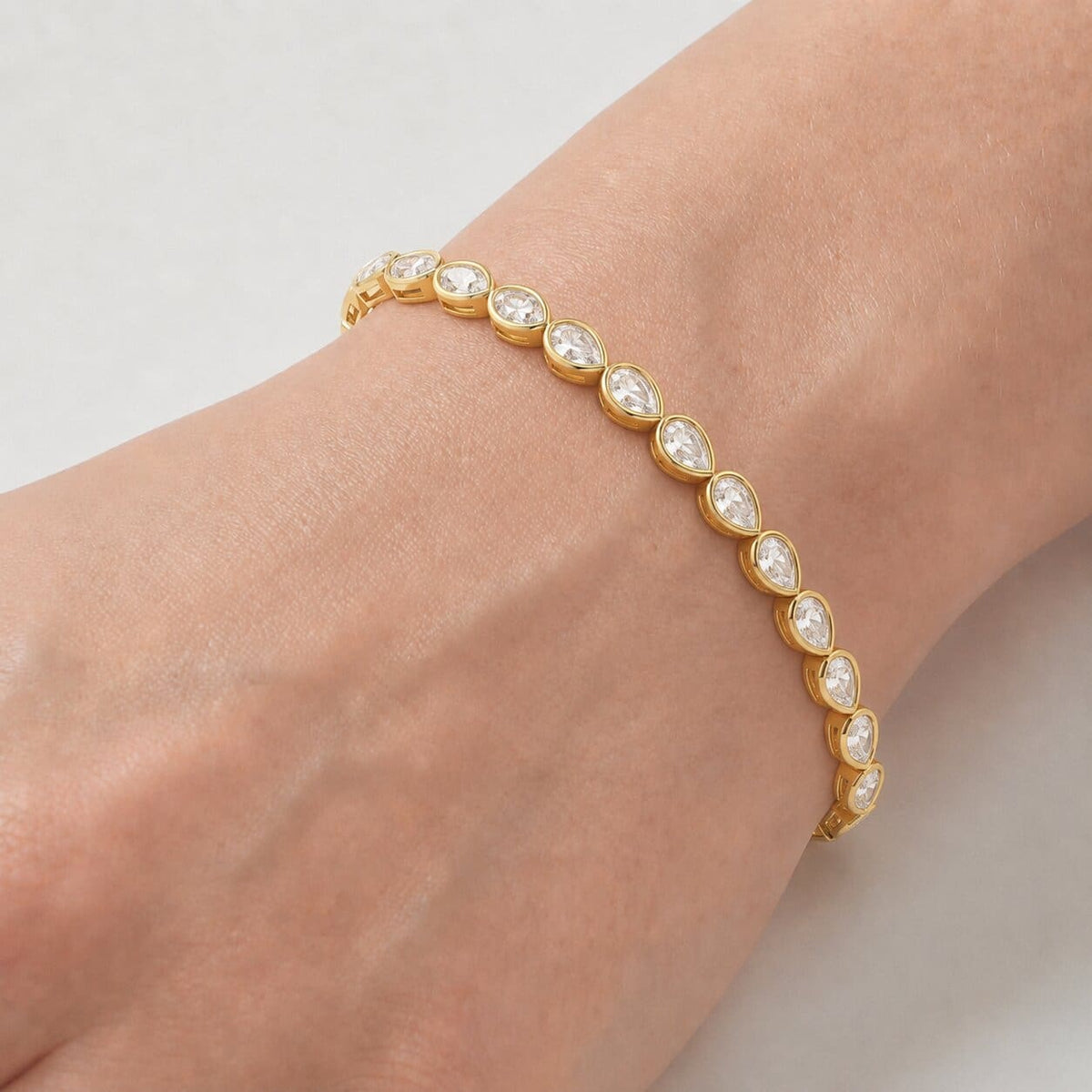 Bezel-Set Pear Diamond Tennis Bracelet, 2.90ct total in Yellow Gold