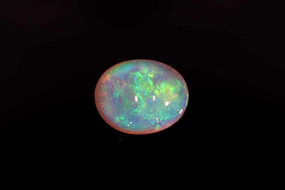 Oval Multi_color Opal 0.82ct loose gemstone