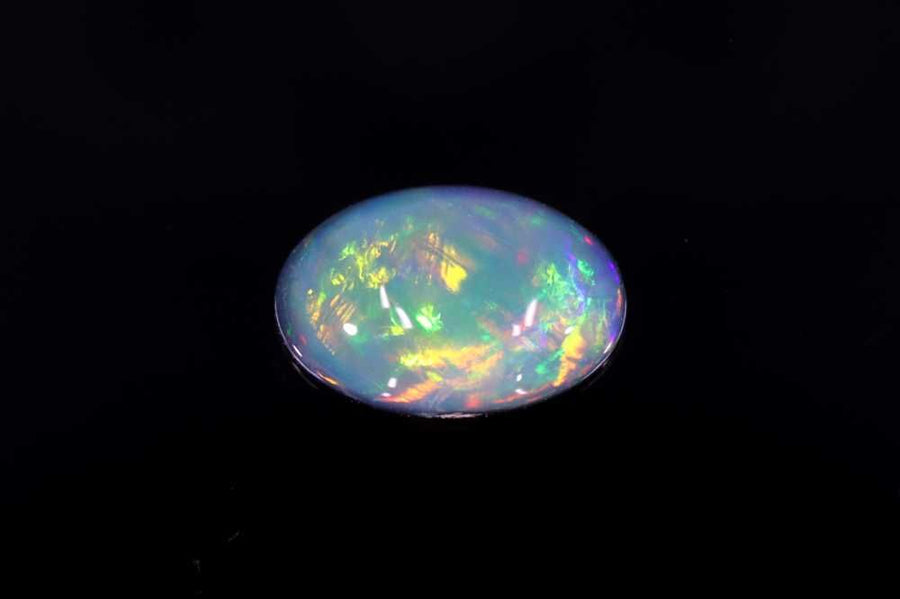 Oval Multi_color Opal 0.98ct loose gemstone