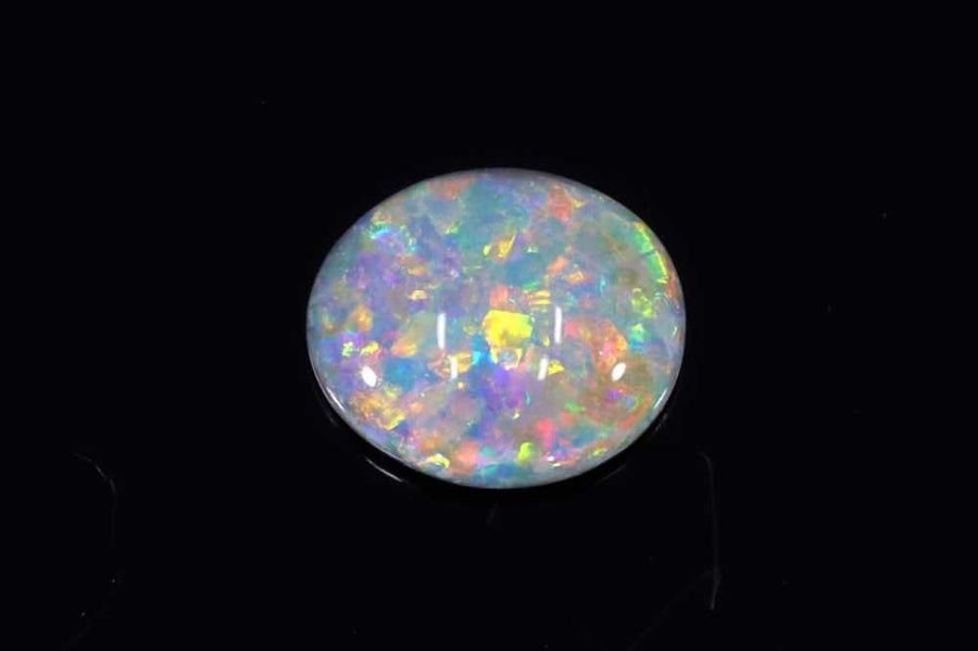 Oval Multi_color Opal 0.65ct loose gemstone
