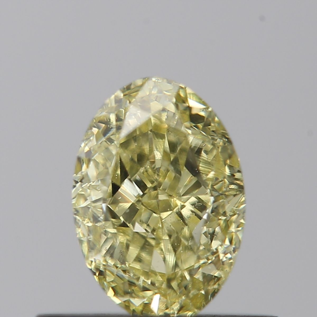 Oval Fancy Light Yellow Natural Diamond 0.65ct SI1 loose diamond