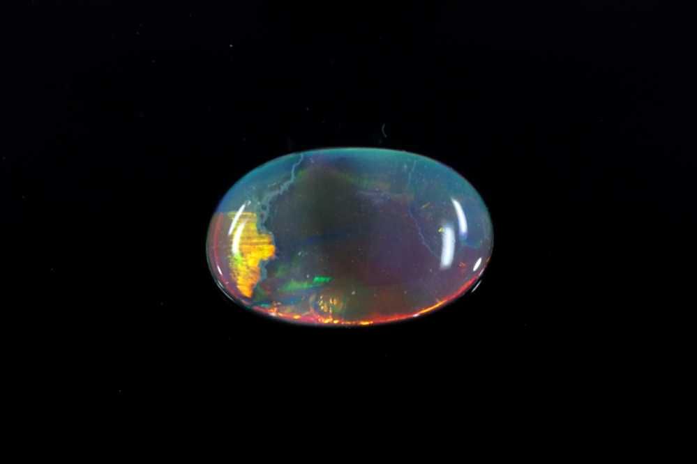 Oval Multi_color Opal 0.45ct loose gemstone
