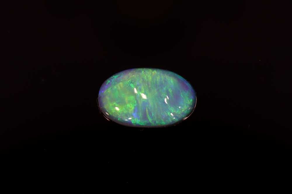 Oval Multi_color Opal 0.6ct loose gemstone