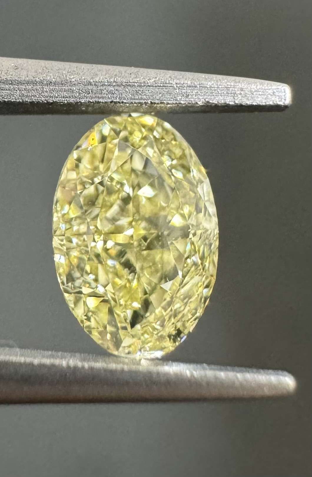 Oval Fancy Yellow Natural Diamond 0.54ct VS1 loose diamond
