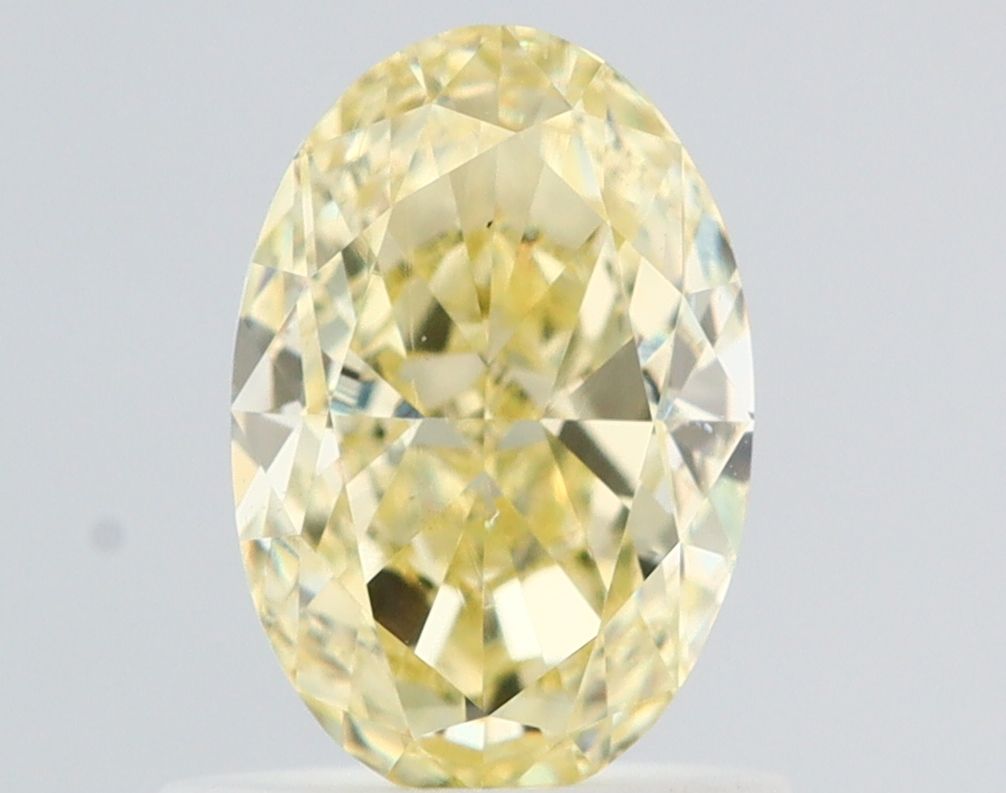 Oval Fancy Light Yellow Natural Diamond 0.99ct VS2 loose diamond