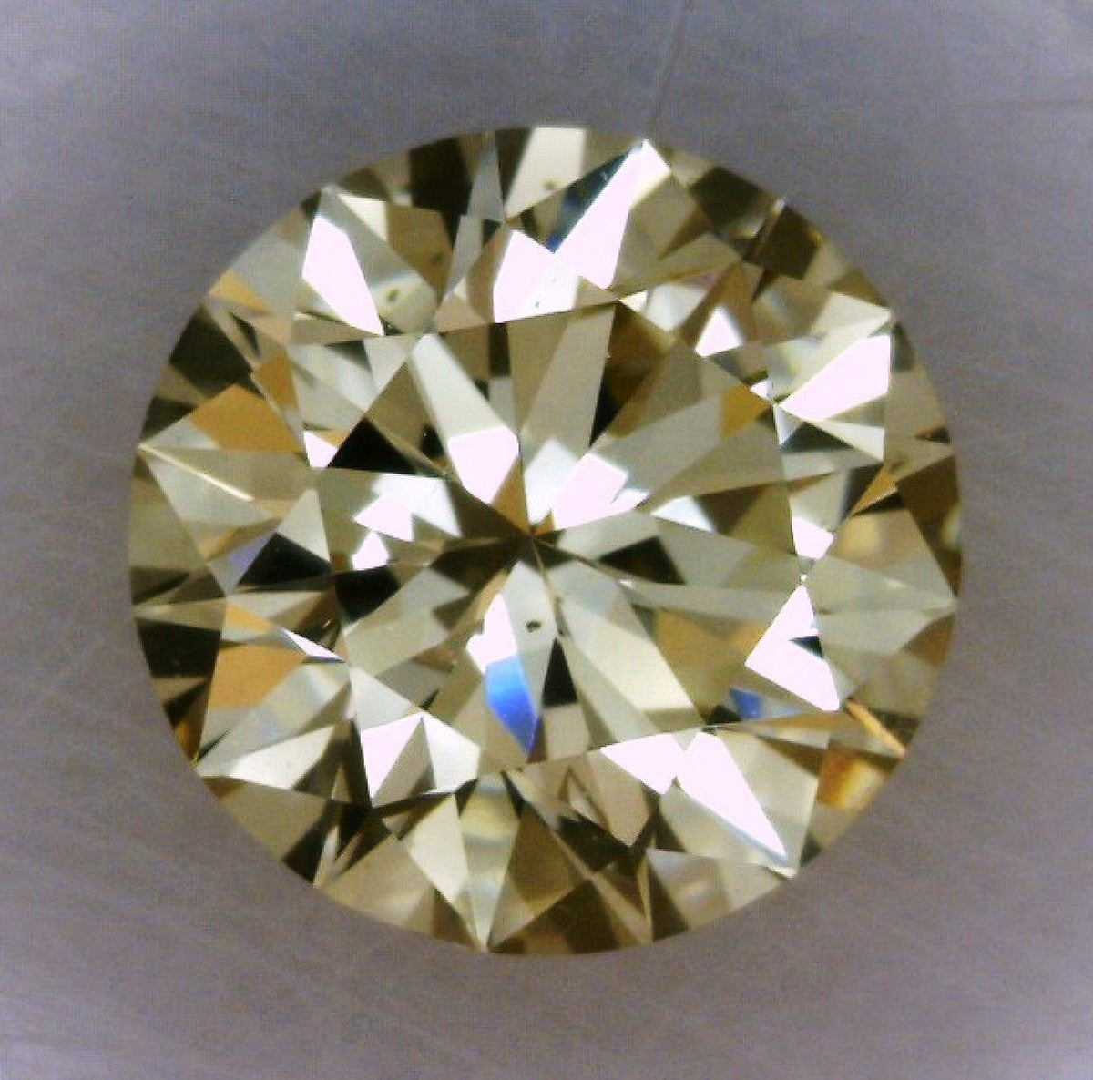 Round Fancy Light Brownish Yellow Natural Diamond 0.64ct VS2 loose diamond