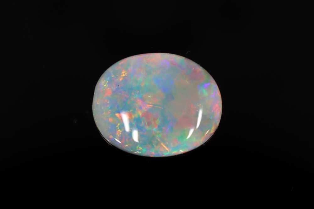 Oval Multi_color Opal 0.89ct loose gemstone
