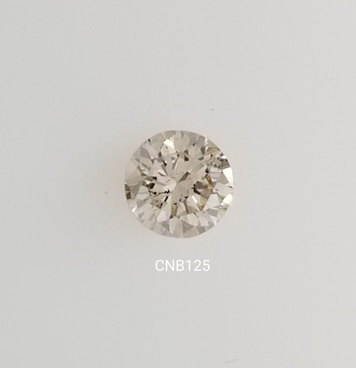 Round Fancy Light Champagne Natural Diamond 0.84ct SI2 loose diamond