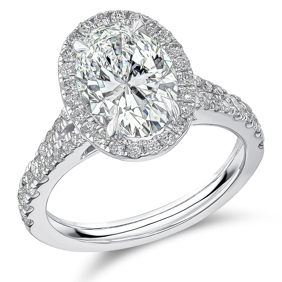 Curved-Shoulder Halo Oval Cut Engagement Ring