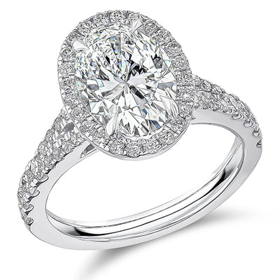 Curved-Shoulder Halo Oval Cut Engagement Ring