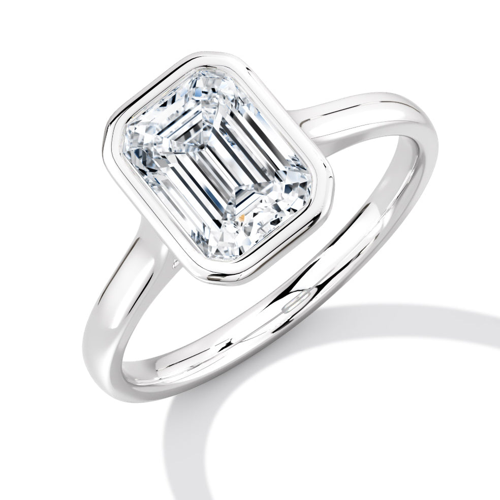 Bezel Set, Solitaire with Plain Shoulders Emerald Cut Engagement Ring, 1.50ct