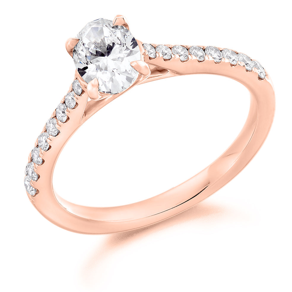 Solitaire with Diamond Shoulders Oval Cut Engagement Ring in Rose Gold