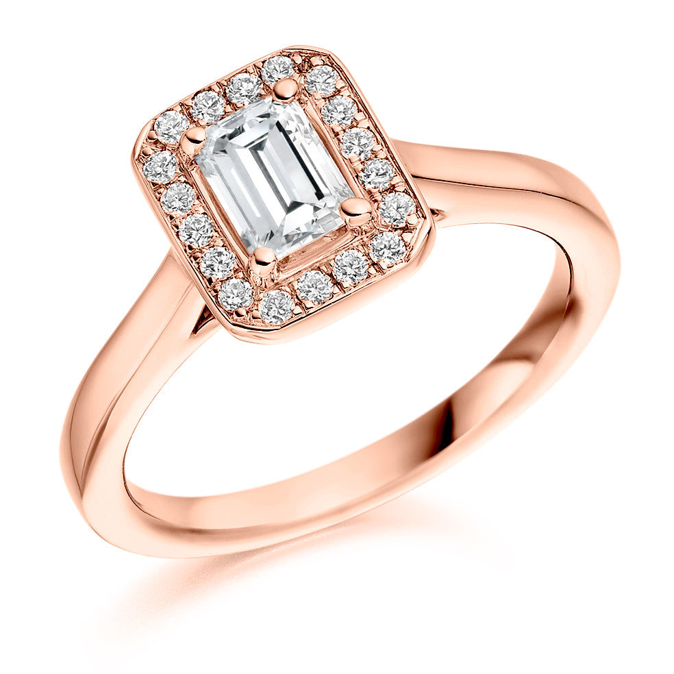 Quiet Halo Emerald Cut Engagement Ring in Rose Gold