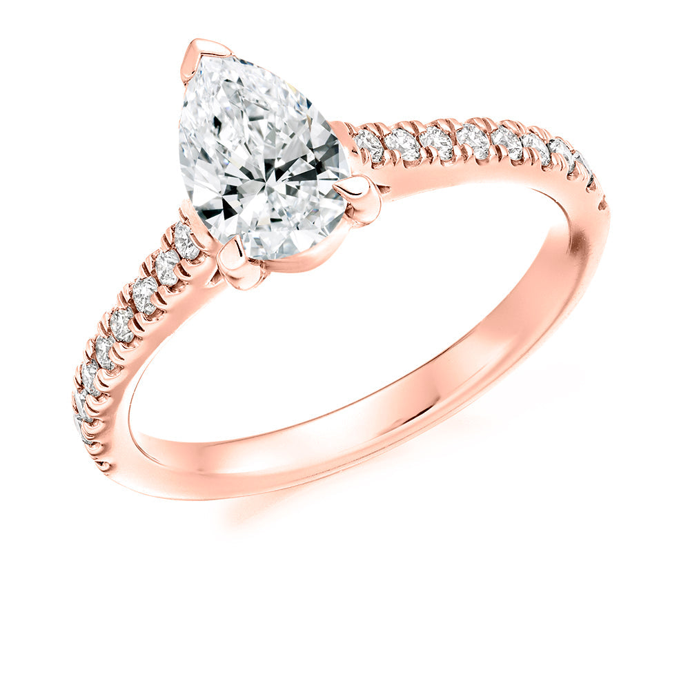 Solitaire with Diamond Shoulders Pear Cut Engagement Ring in Rose Gold