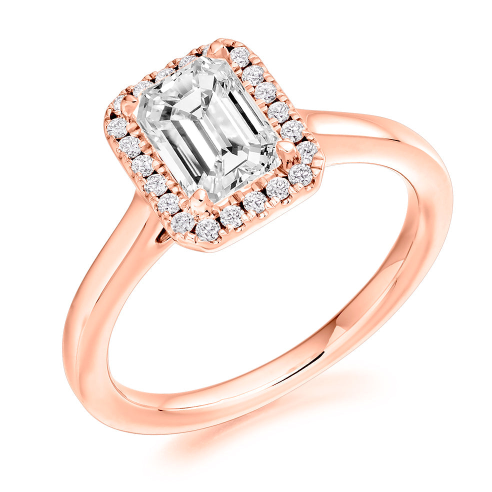 Clean-Shouldered Halo Emerald Cut Engagement Ring in Rose Gold