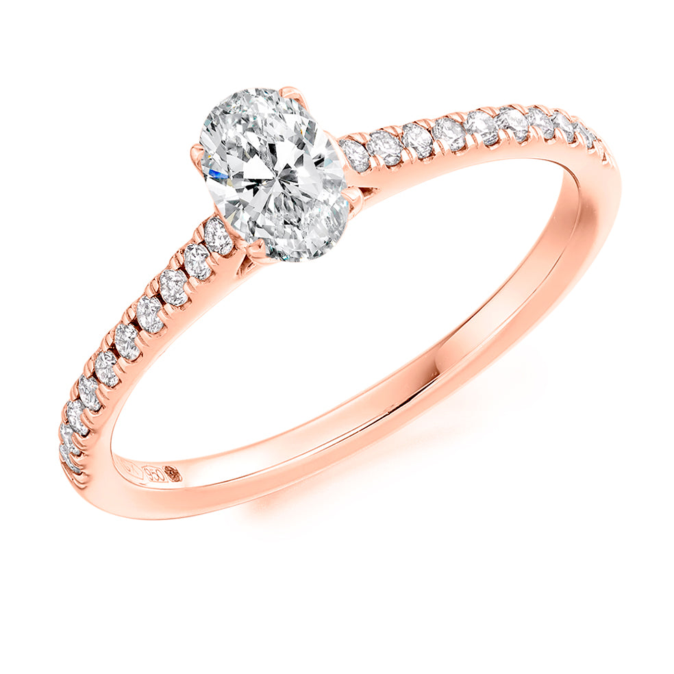 Diamond-Shouldered Solitaire Oval Cut Engagement Ring in Rose Gold