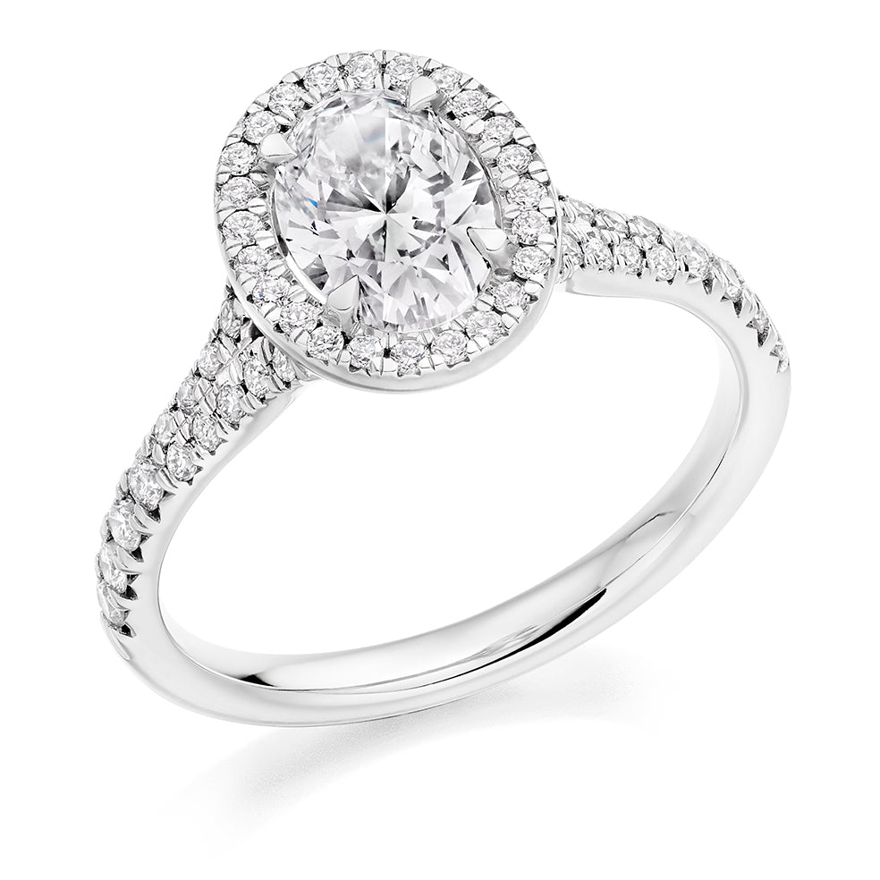 Split-Shoulder Halo Oval Cut Engagement Ring in White Gold