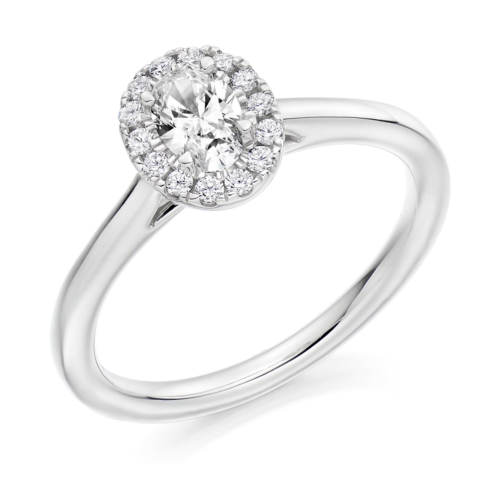 Halo with Plain Shoulders Oval Cut Engagement Ring in White Gold
