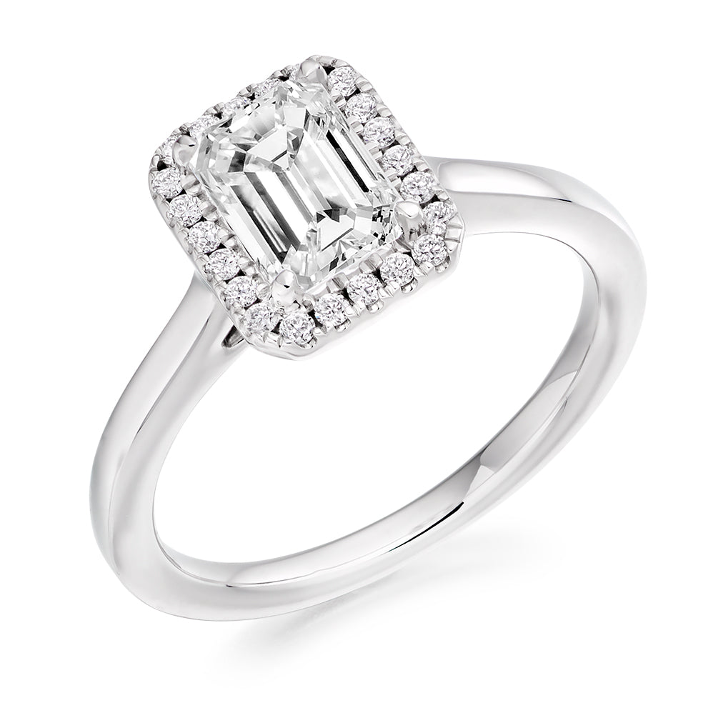 Clean-Shouldered Halo Emerald Cut Engagement Ring in White Gold