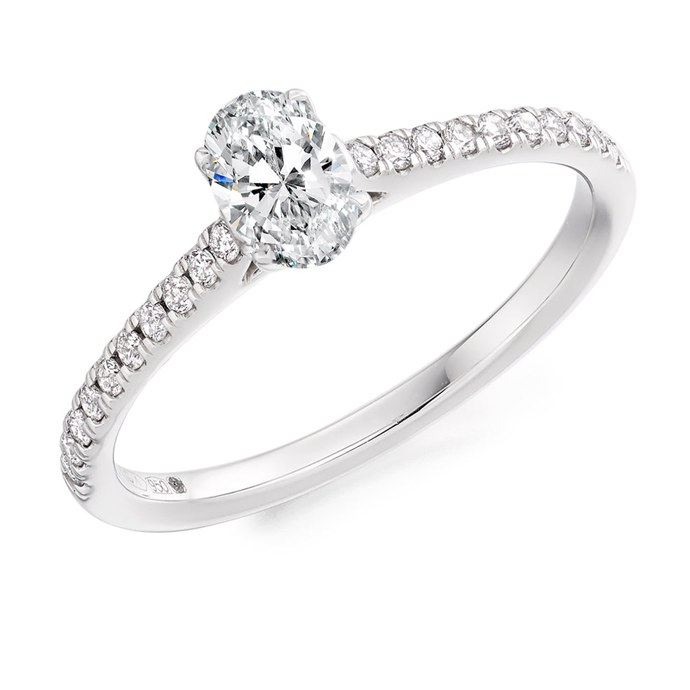Diamond-Shouldered Solitaire Oval Cut Engagement Ring in White Gold