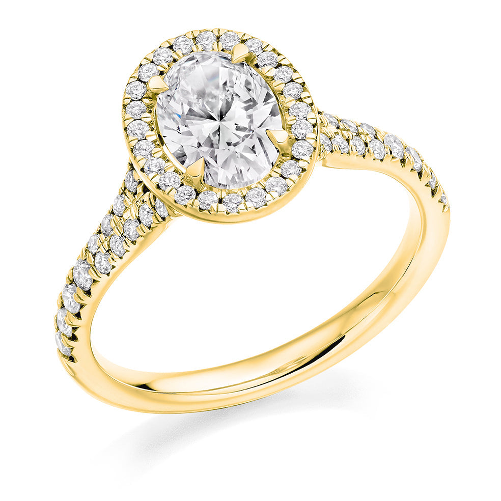 Split-Shoulder Halo Oval Cut Engagement Ring in Yellow Gold