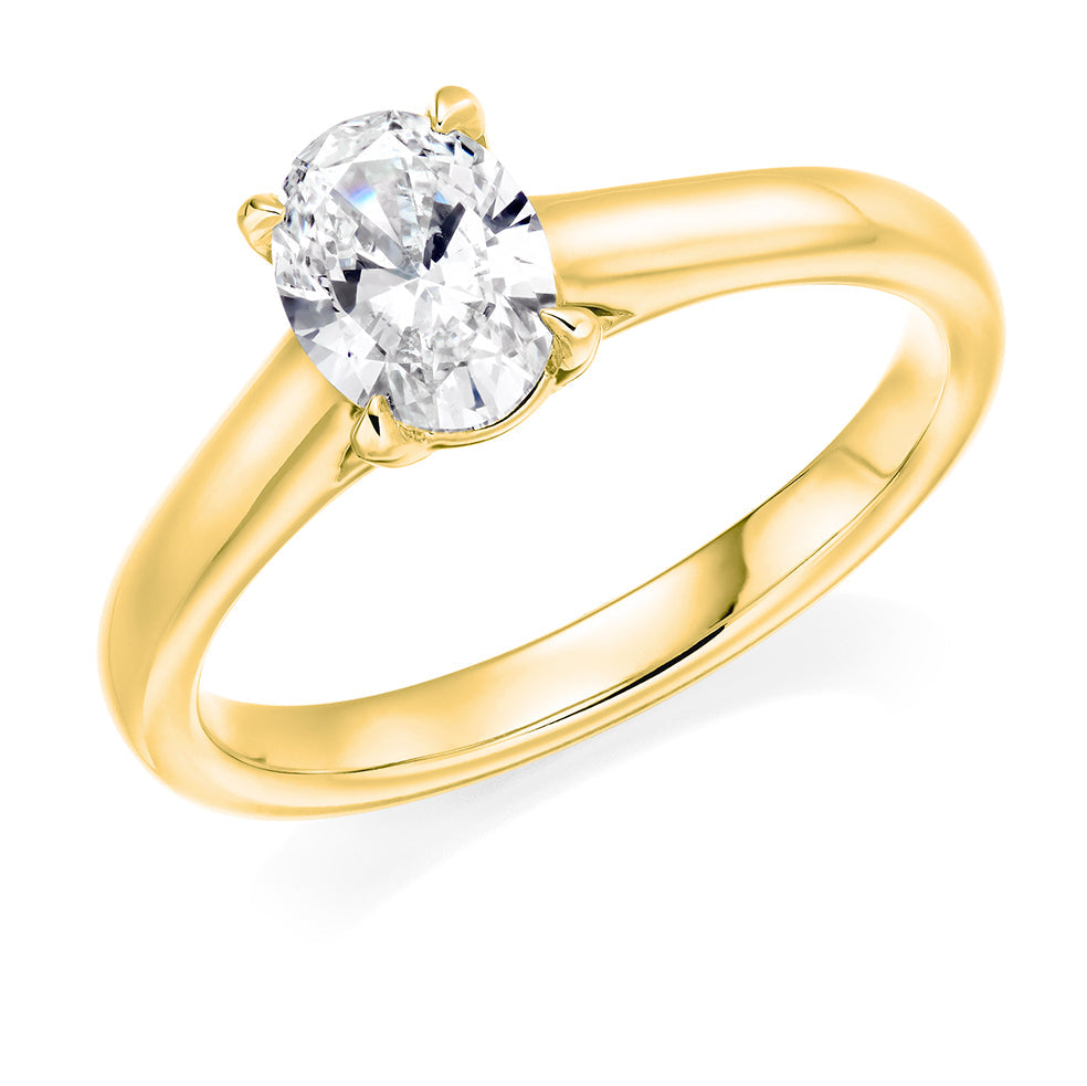 Simple Solitaire Oval Cut Engagement Ring in Yellow Gold