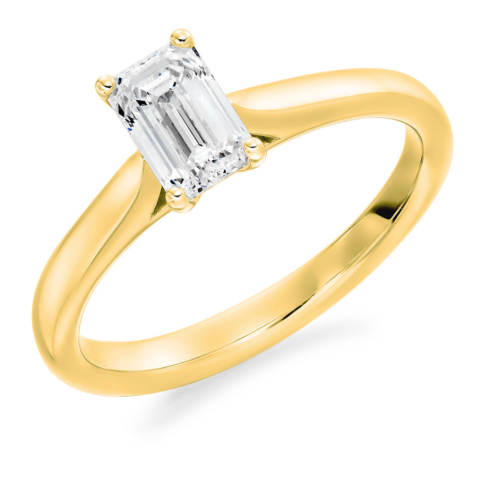 Solitaire Emerald Cut Engagement Ring in Yellow Gold