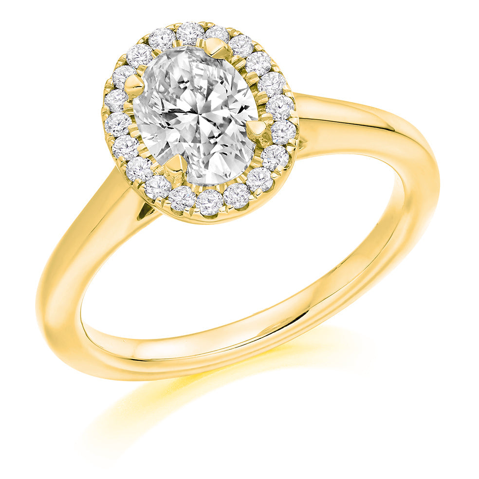Clean-Shouldered Halo Oval Cut Engagement Ring in Yellow Gold