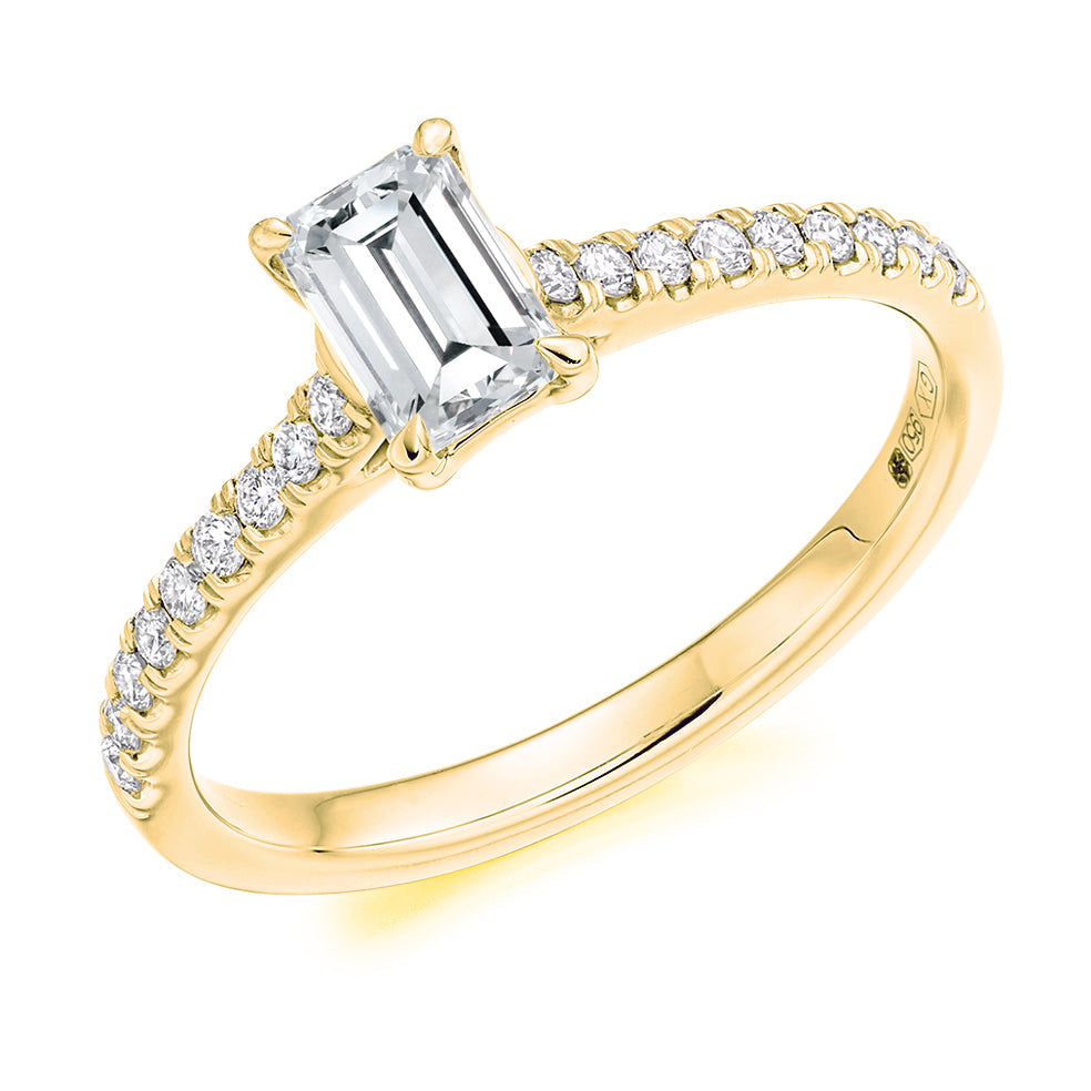 Accent-Shouldered Solitaire Emerald Cut Engagement Ring in Yellow Gold