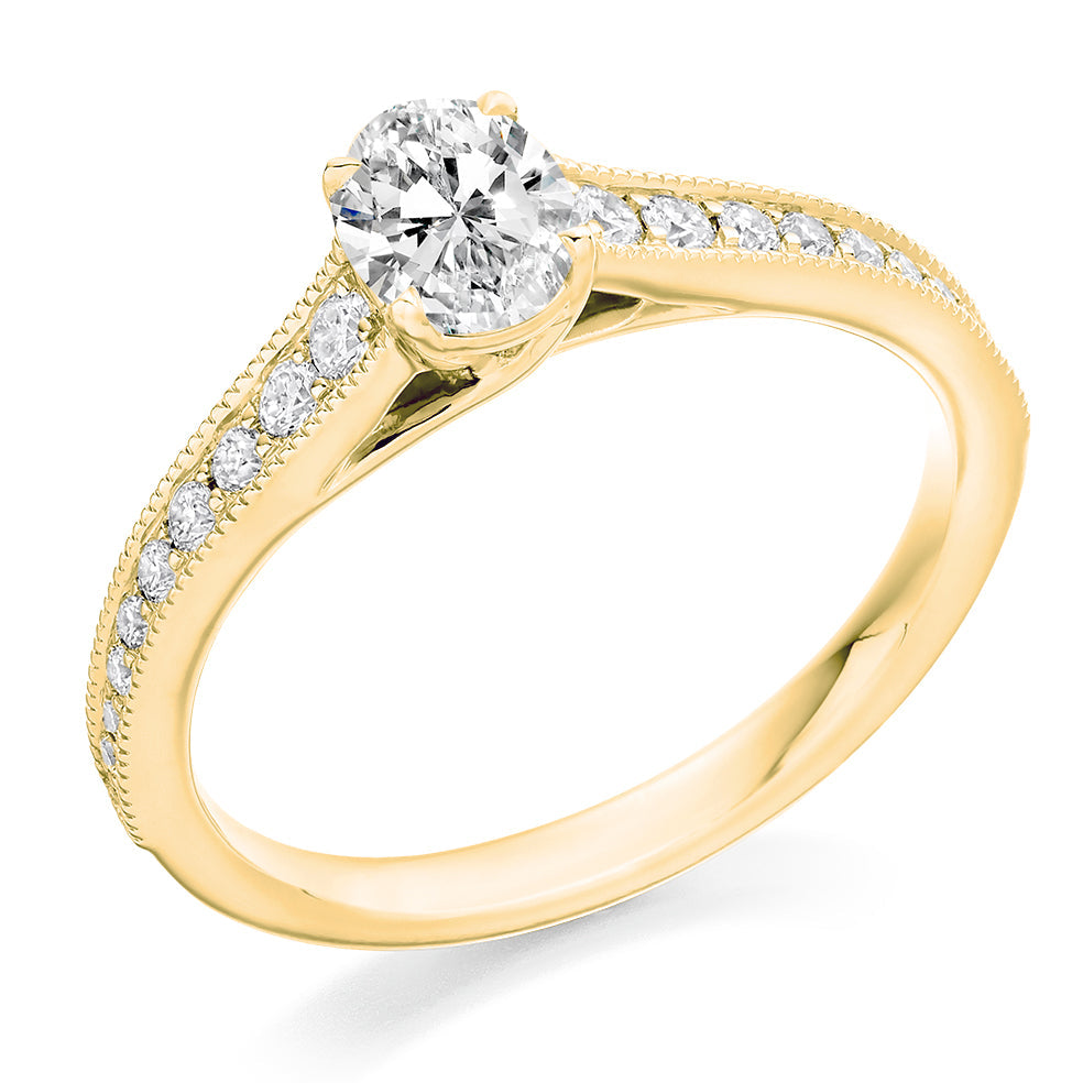 Fine Pavé Solitaire Oval Cut Engagement Ring in Yellow Gold