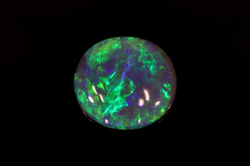 Oval Multi_color Opal 1.25ct loose gemstone