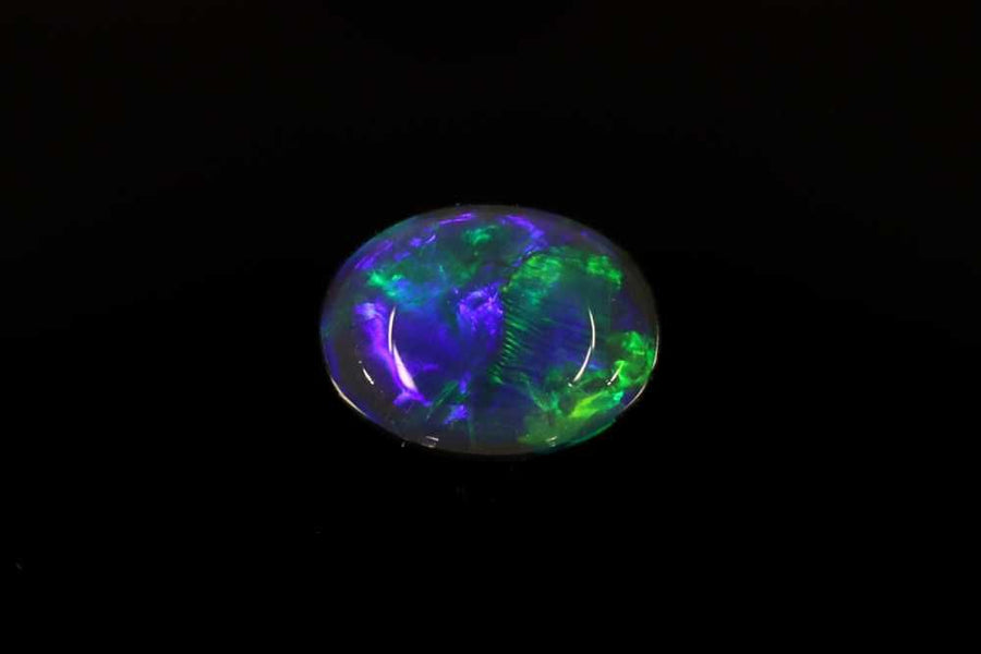 Oval Multi_color Opal 0.54ct loose gemstone