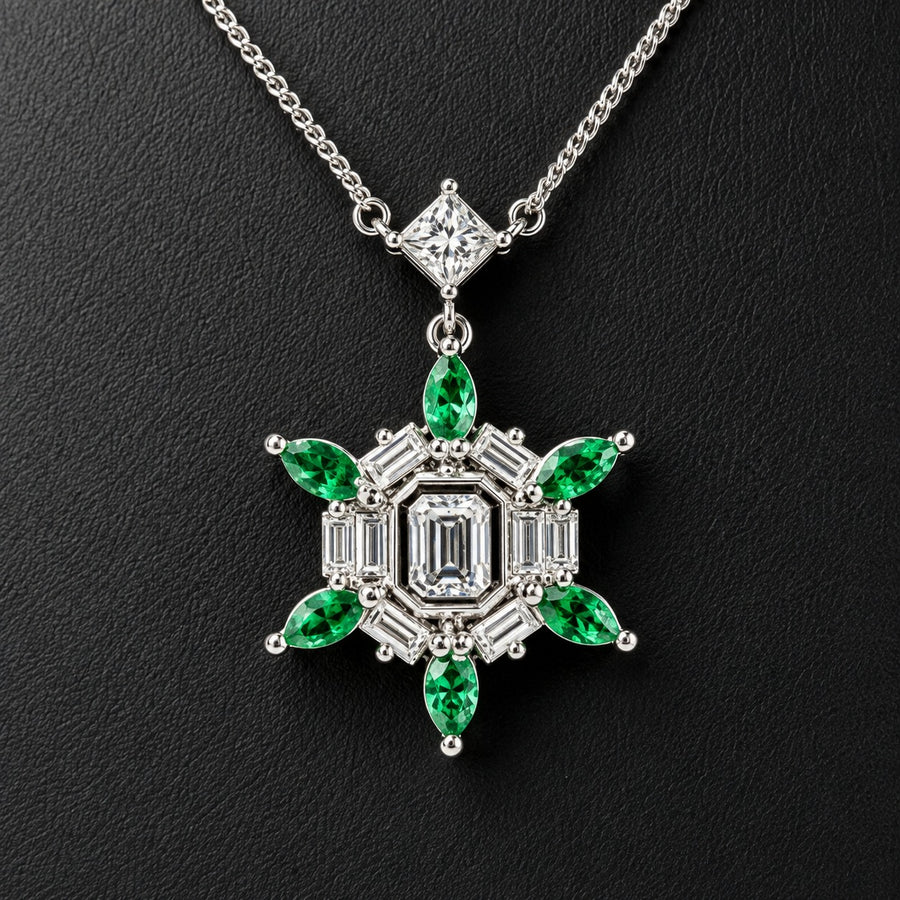 Platinum pendant with a central emerald cut diamond framed by baguettes and six marquise emeralds
