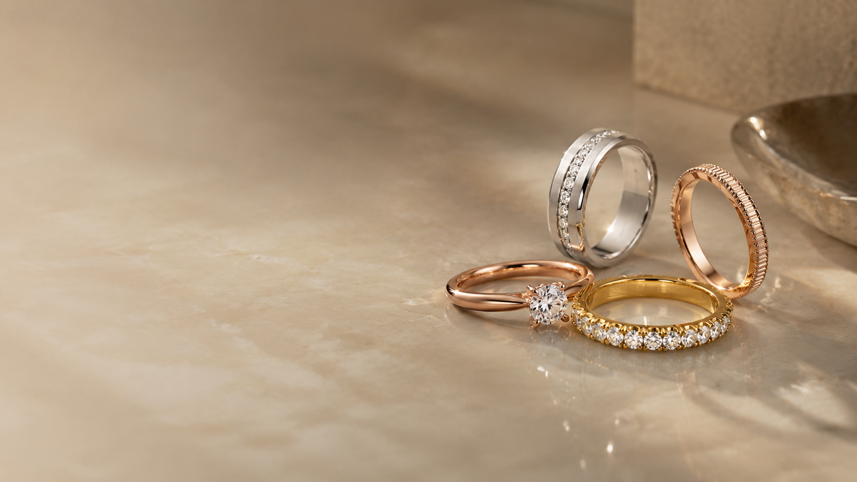 A stack of gold and rose gold rings worn together