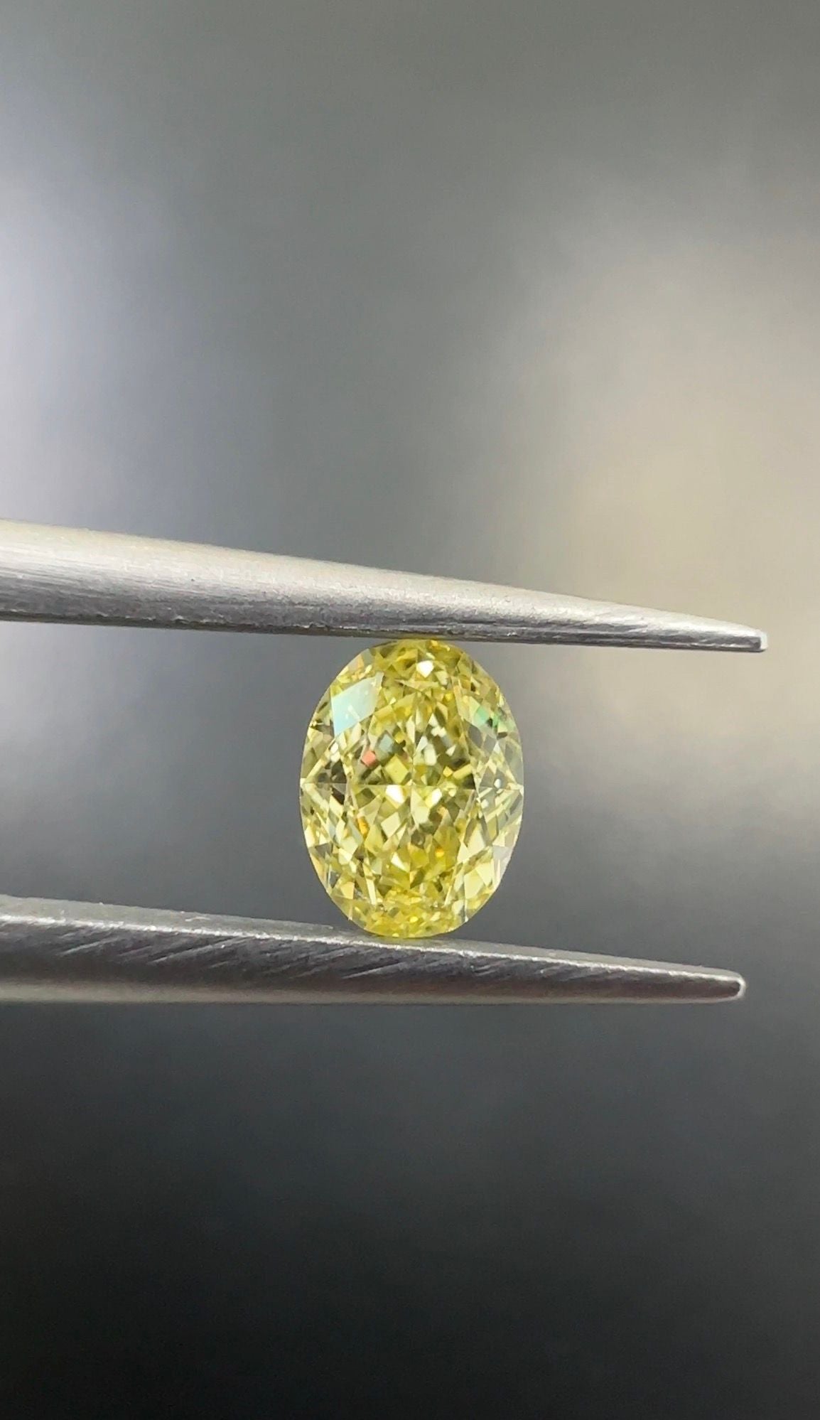Oval Fancy Intense Yellow Natural Diamond 0.5ct VS2 loose diamond