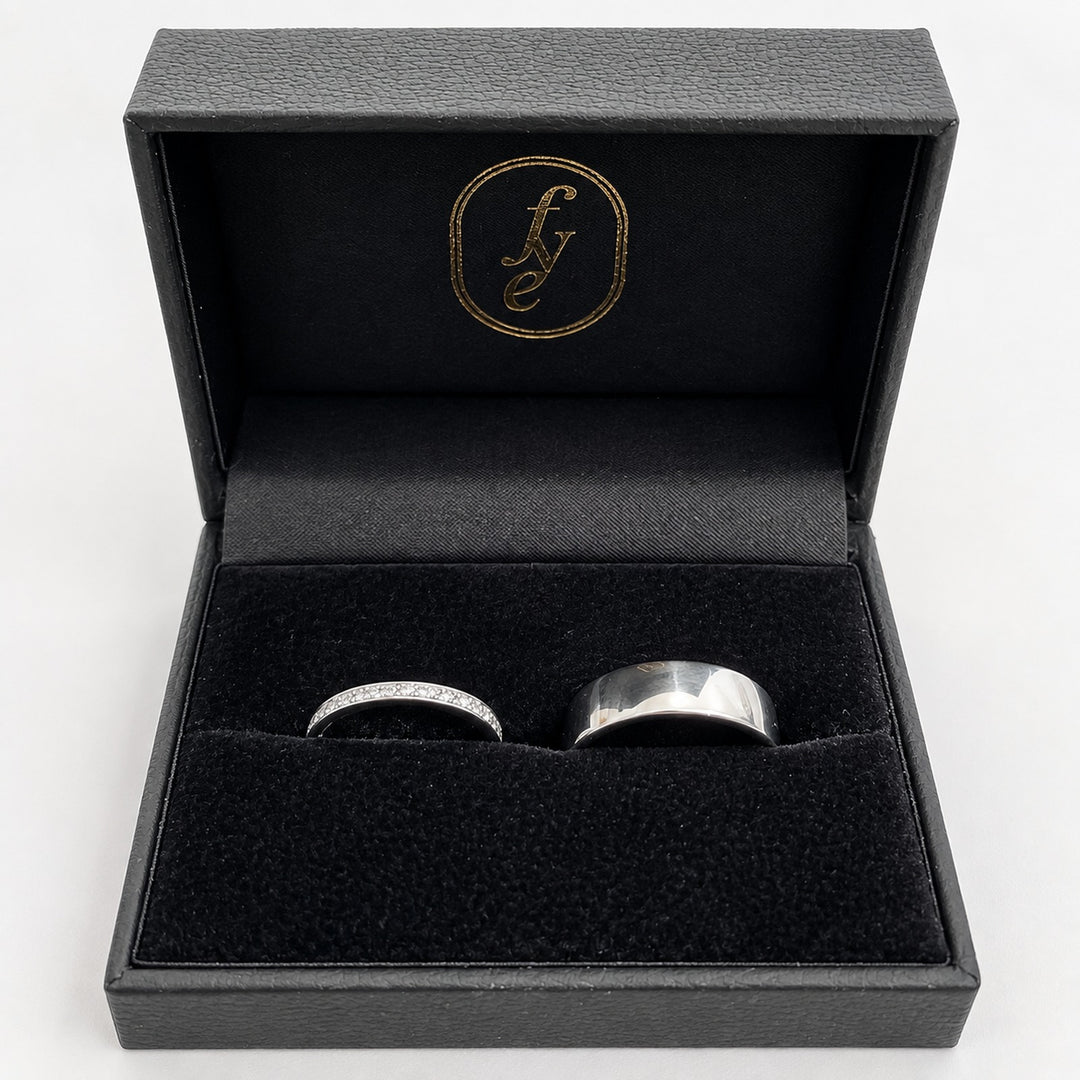 Platinum diamond wedding ring and white gold court band boxed as a pair