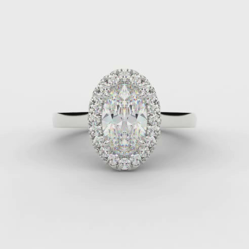 Quiet Halo Oval Cut Engagement Ring turning under light