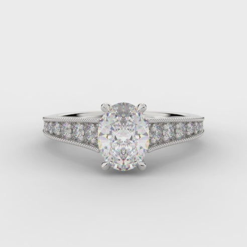Grain-Set Solitaire Oval Cut Engagement Ring turning under light