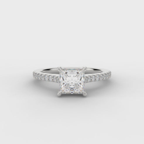 Solitaire with Diamond Set Shoulders Princess Cut Engagement Ring, 0.75ct turning under light
