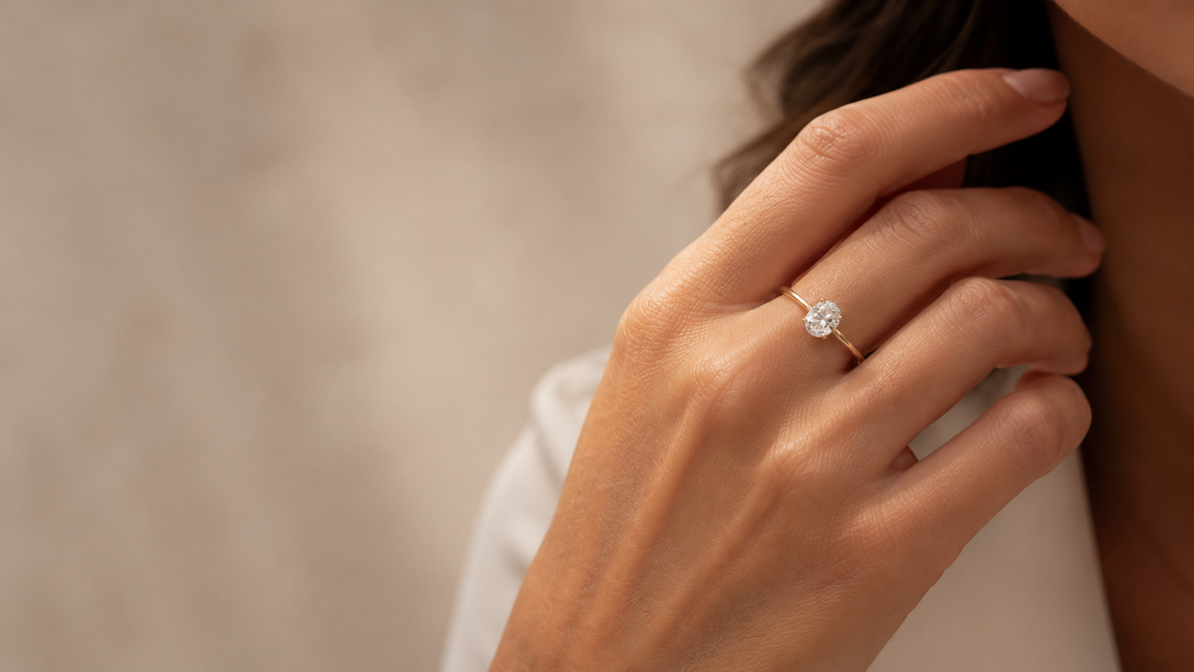 A solitaire engagement ring worn on the hand