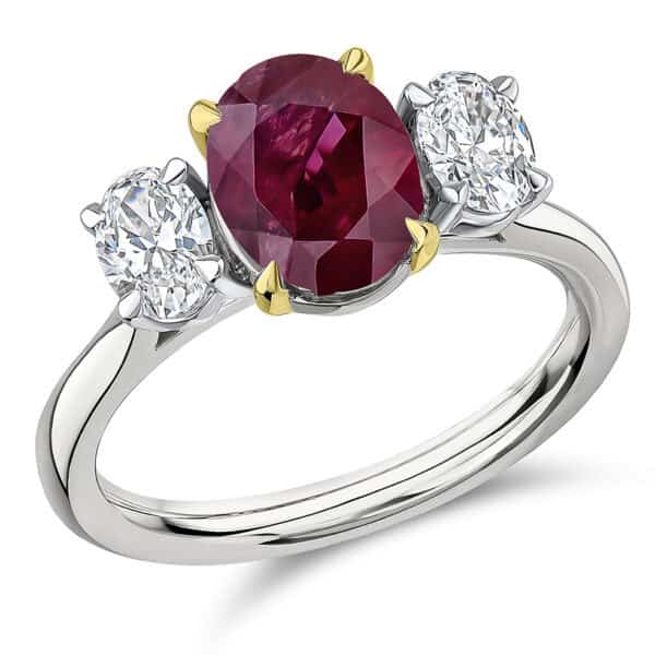 Ruby and Diamond Oval Cut Trilogy Engagement Ring