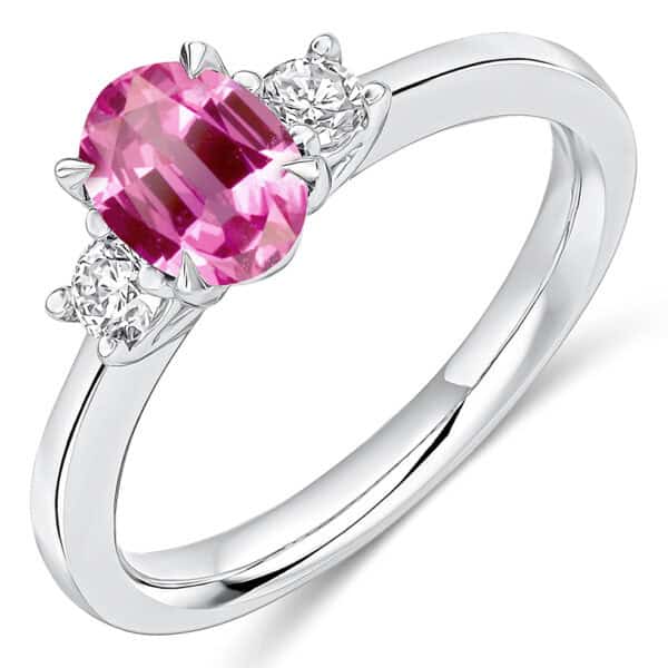 Pink Sapphire and Diamond Oval Cut Trilogy Engagement Ring