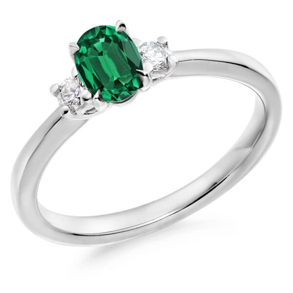 Emerald and Diamond Oval Cut Trilogy Engagement Ring