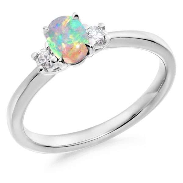 Opal and Diamond Oval Cut Trilogy Engagement Ring
