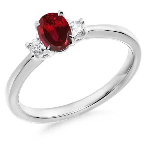 Ruby and Diamond Oval Cut Trilogy Engagement Ring