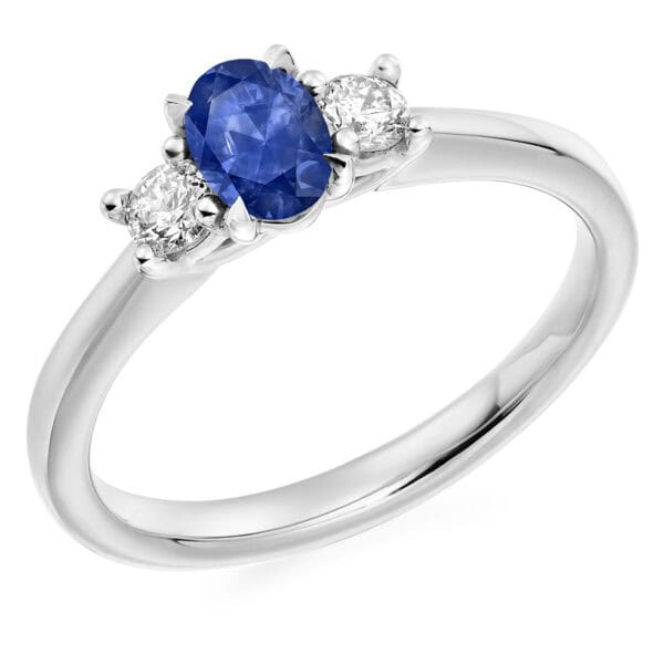 Blue Sapphire and Diamond Oval Cut Trilogy Engagement Ring