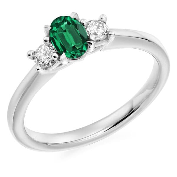 Emerald and Diamond Oval Cut Trilogy Engagement Ring
