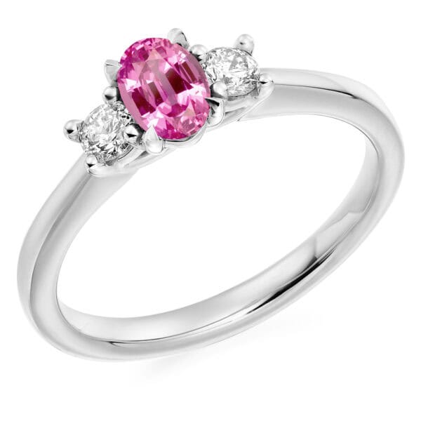 Pink Sapphire and Diamond Oval Cut Trilogy Engagement Ring